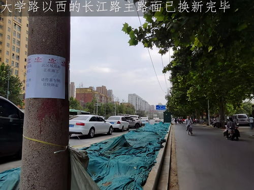 郑州长江路 施工围挡下的市民期盼——城市改造工程如何更人性化？